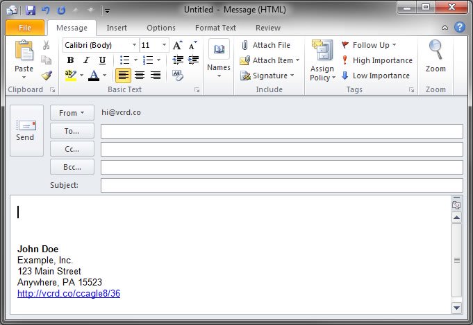 An email signature with a vCard link